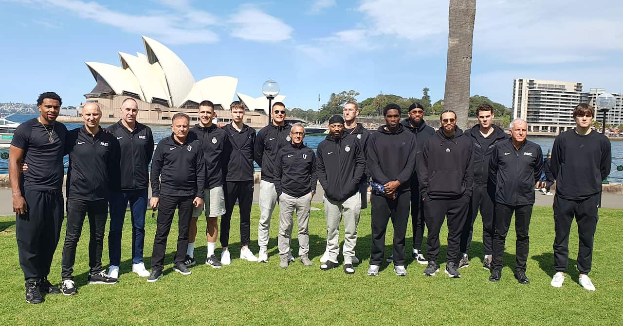 Partizan Belgrade Basketball Club players and staff pose for a photo in Sydney