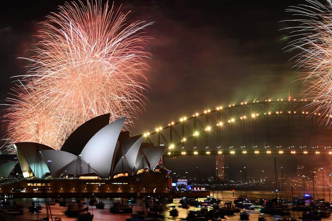 Fireworks are seen over the Sydney Opera House and Harbour Bridge during New Year’s Eve celebrations in Sydney