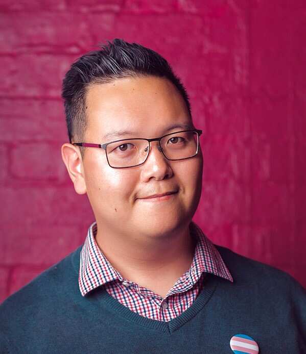 Reggie Chang is seen posing for a photo.