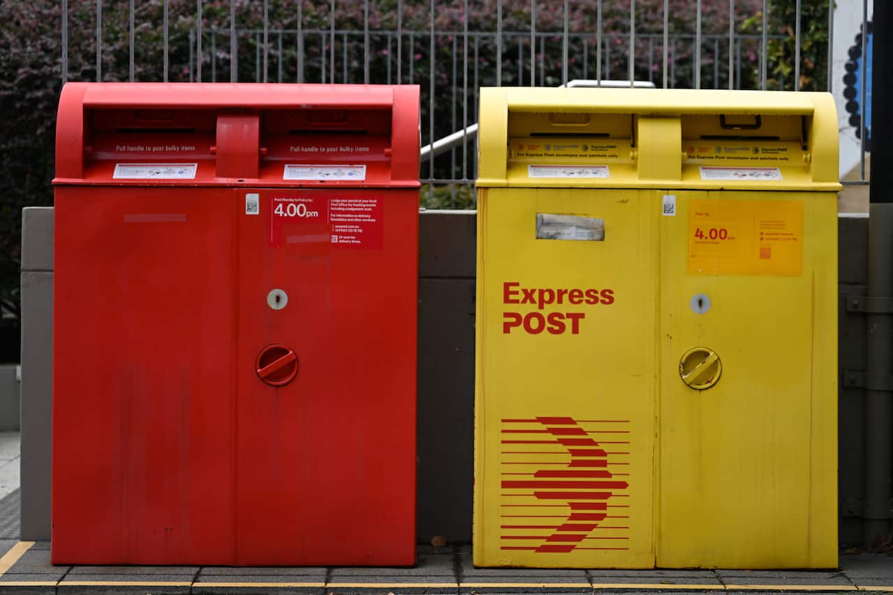 Australia Post standard mail and Express Post letter boxes at Australia Post Strawberry Hills Post Office in Sydney.