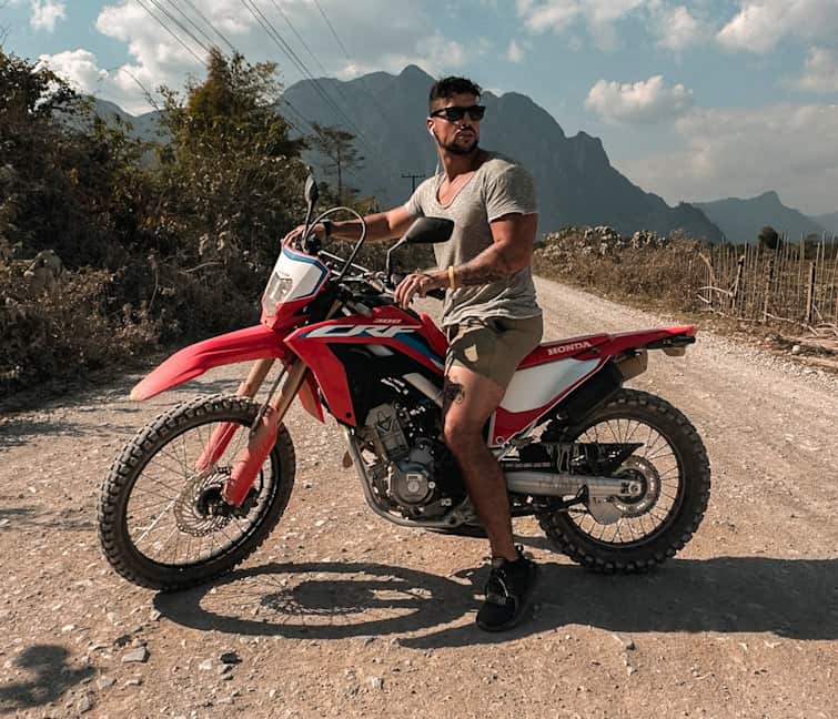 Luca Ferraina in Laos on a motorcycle