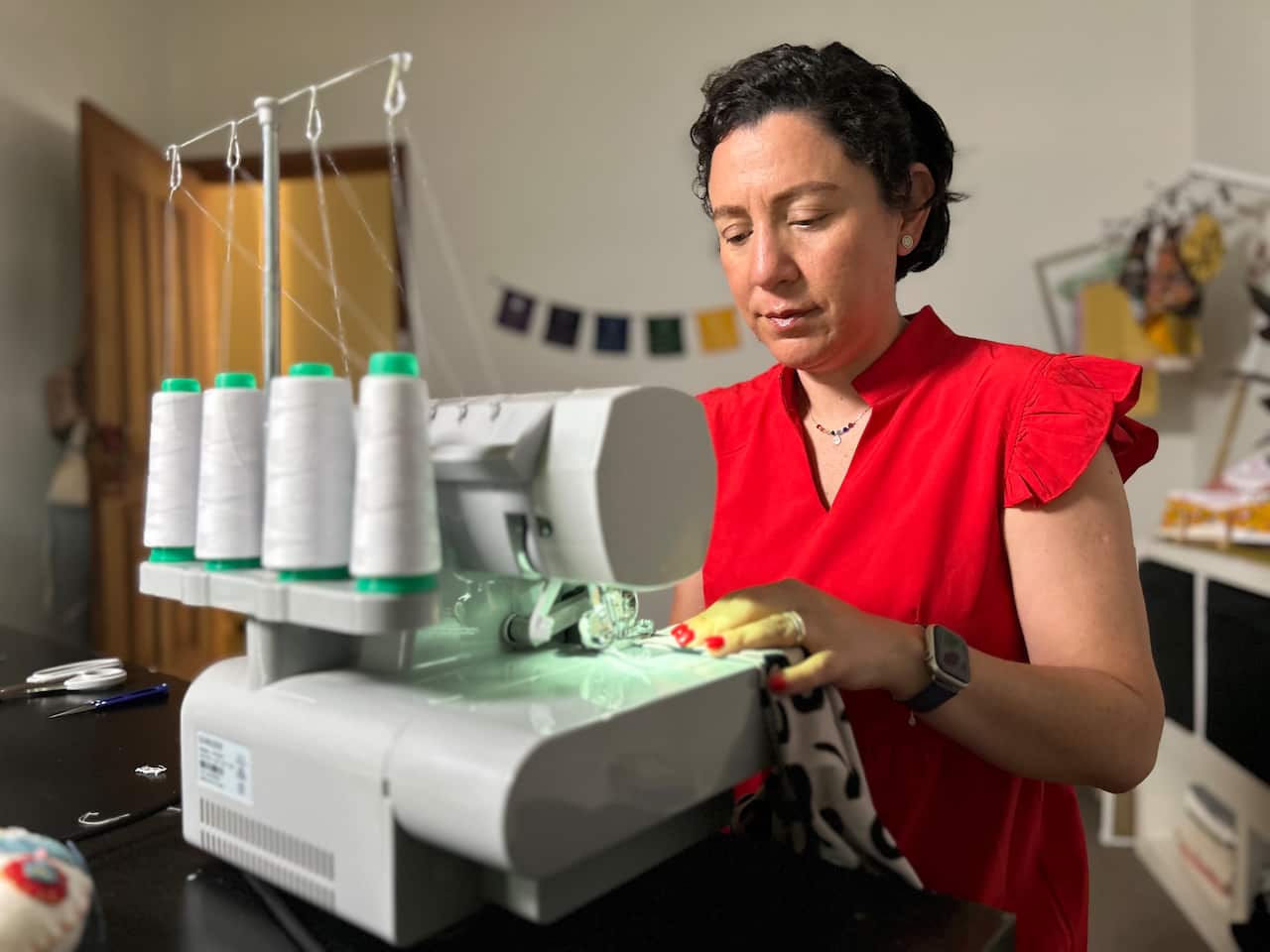 Macarena Erbs at the sewing machine in her Melbourne studio.