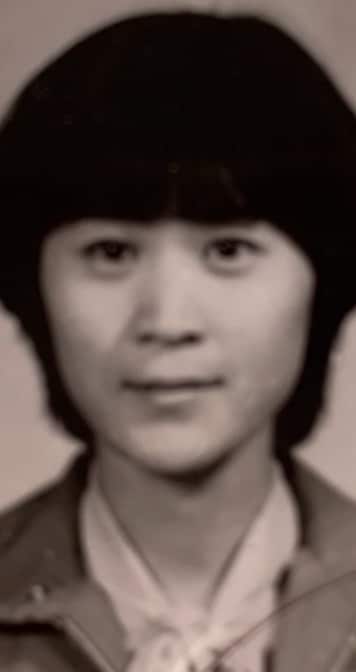 A black and white photo of a young woman