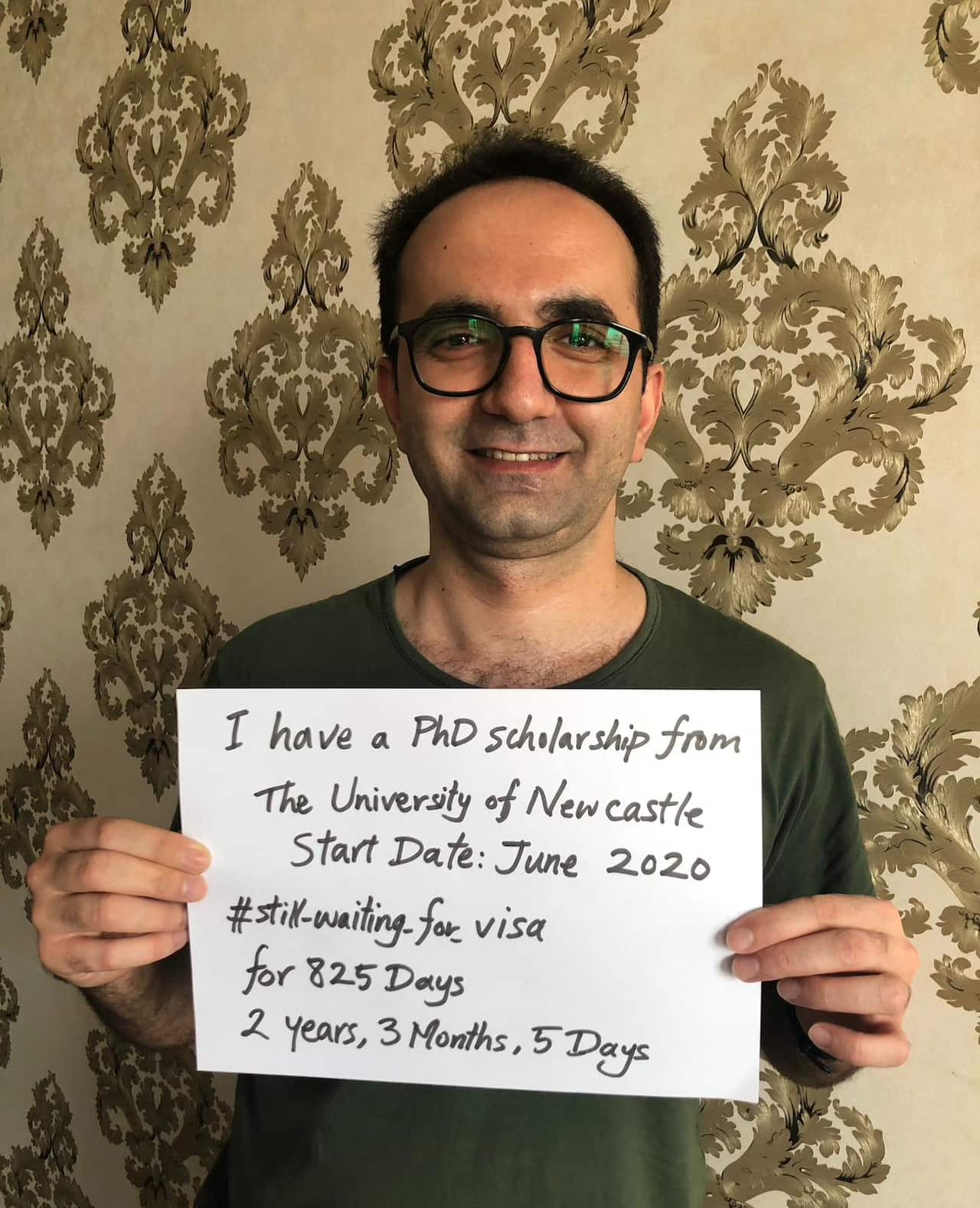 A man holding up a sign. 