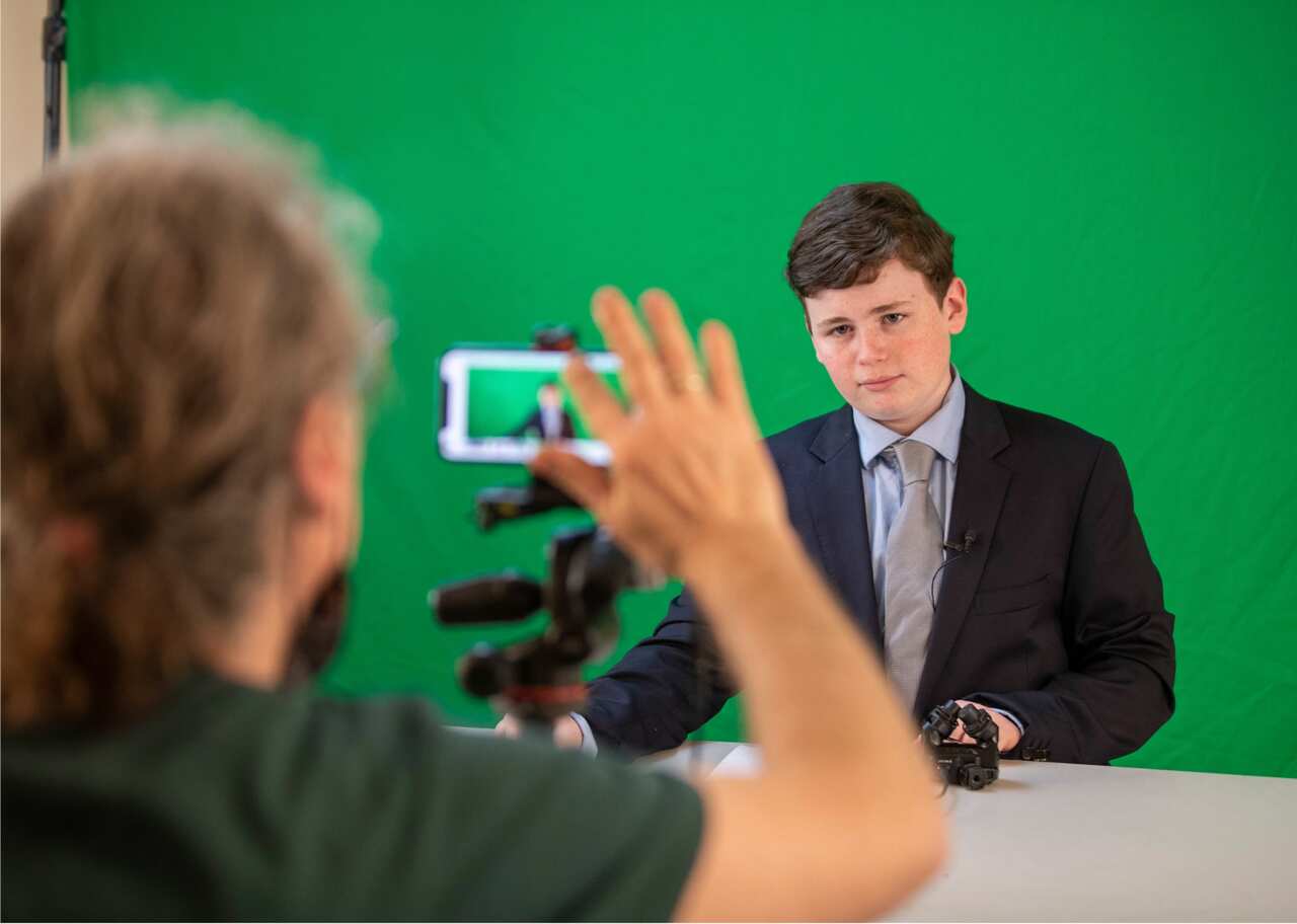 Leo Puglisi prepares for filming from a set-up in his Melbourne home. 