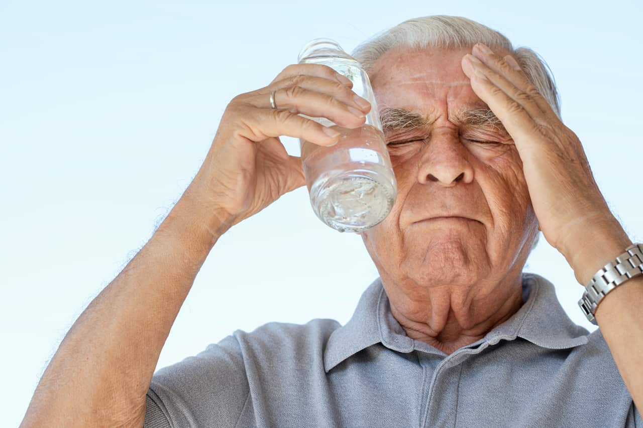 Senior man trying to cool down