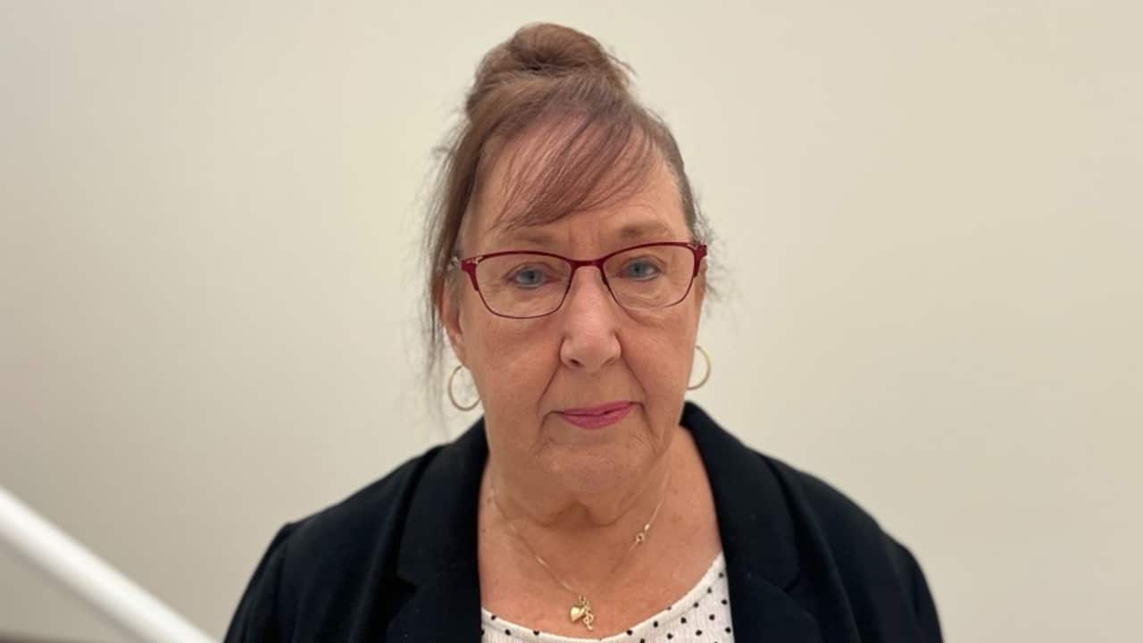 an older woman with glasses on