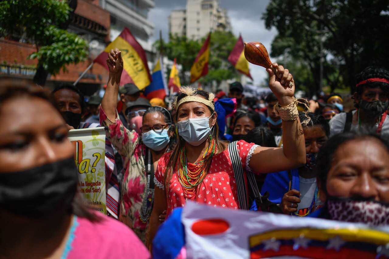 Women march in protest. 
