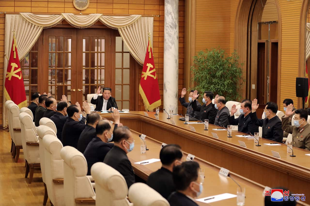 Several people participate in a meeting