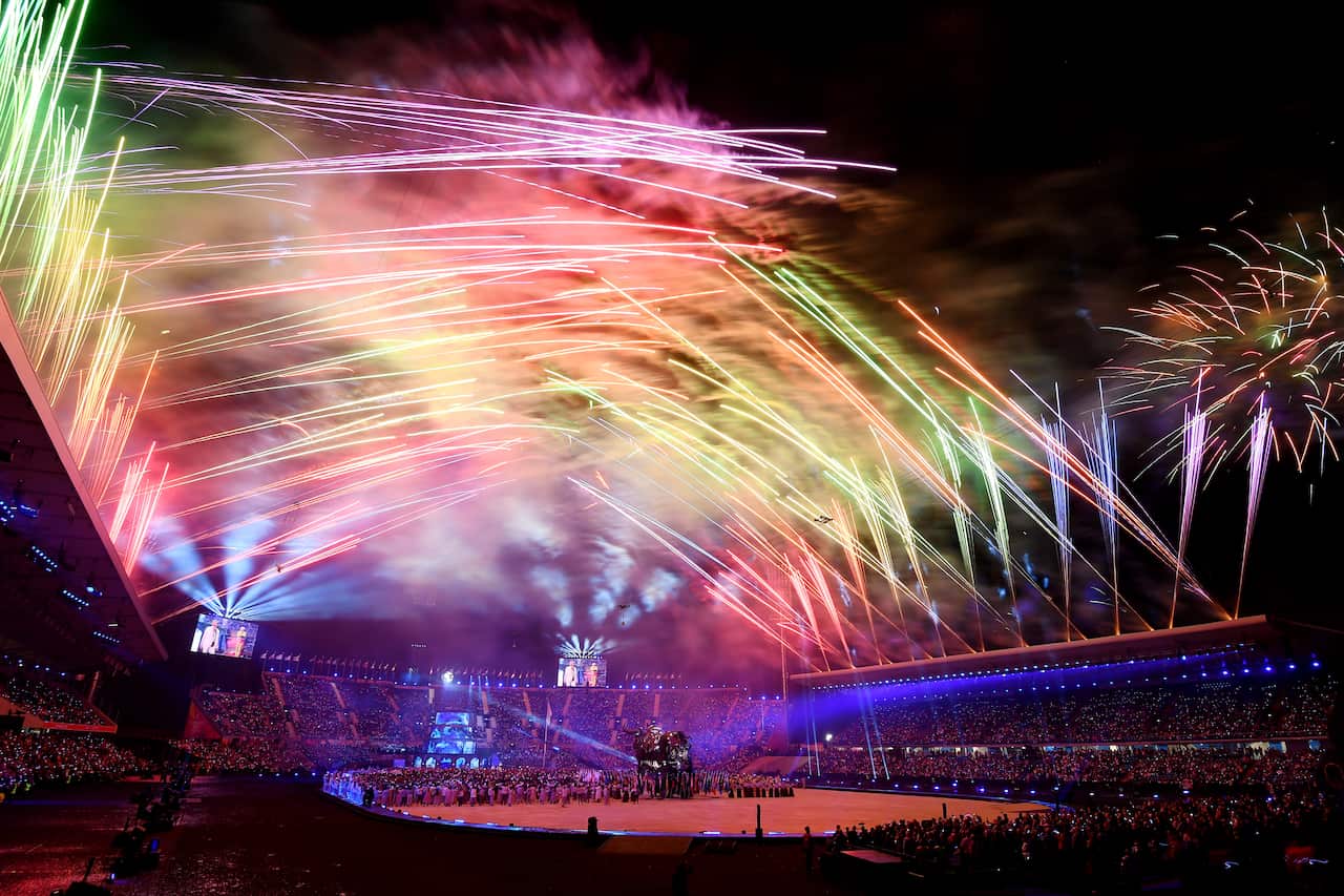 Fireworks explode on top of the stadium
