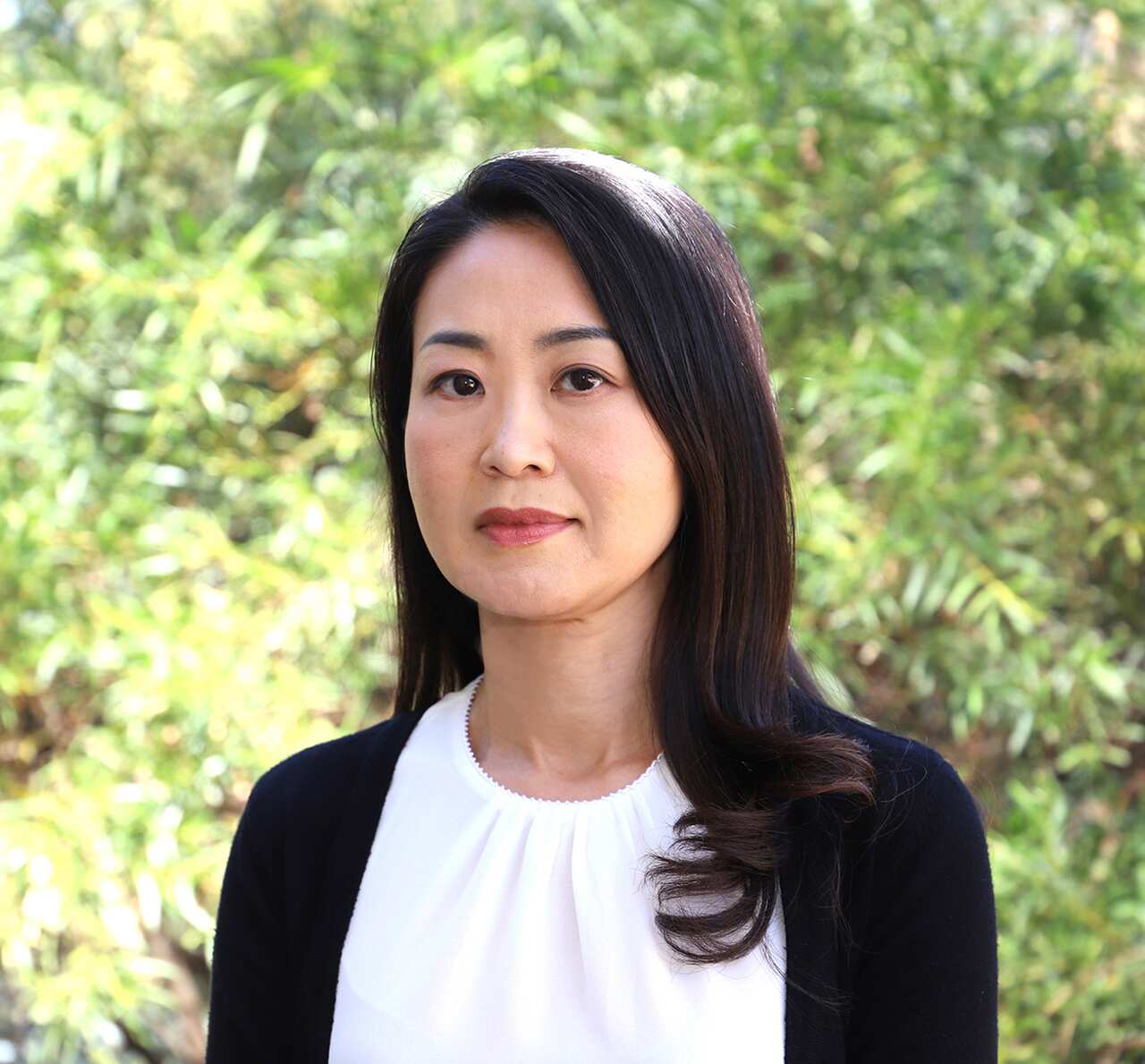 A portrait of Professor Sora Park standing outside. 