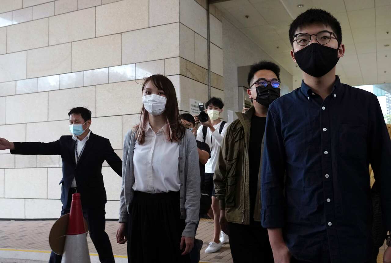 Activists arriving at a Hong Kong court