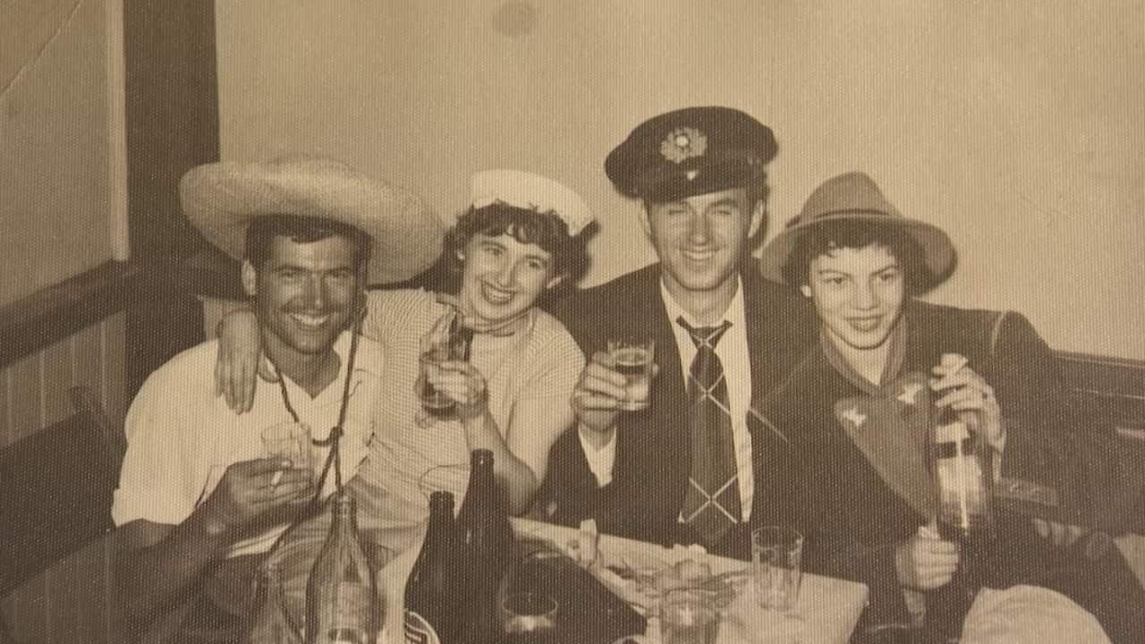 Archival photo of group drinking at Concordia Club 