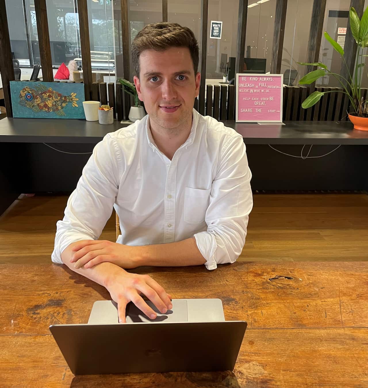 Jordan O'Reilly working on a laptop.