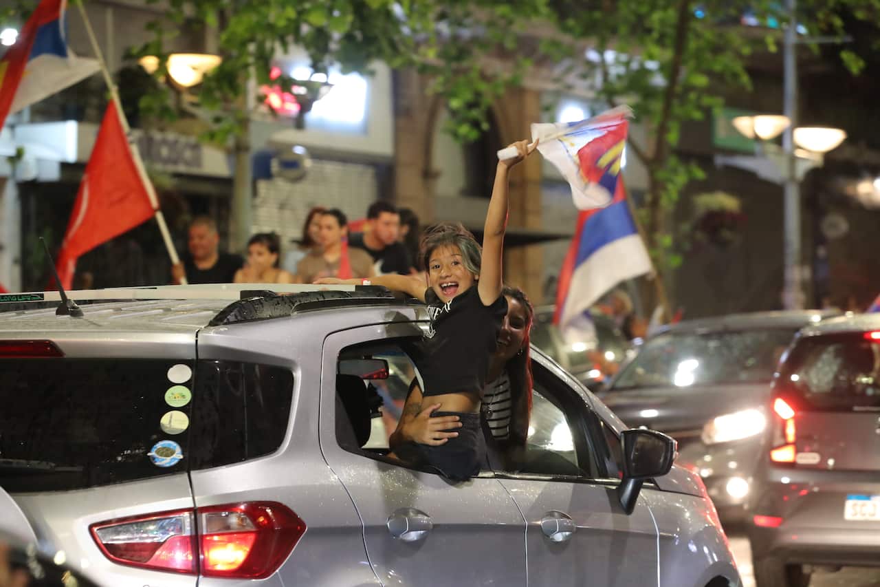 Members of the Frente Amplio celebrate victory