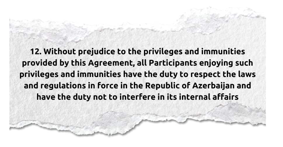 Strip of paper reading "12. Without prejudice to the privileges and immunities provided by this Agreement, all Participants enjoying such privileges and immunities have the duty to respect the laws and regulations in force in the Republic of Azerbaijan and have the duty not to interfere in its internal affairs"