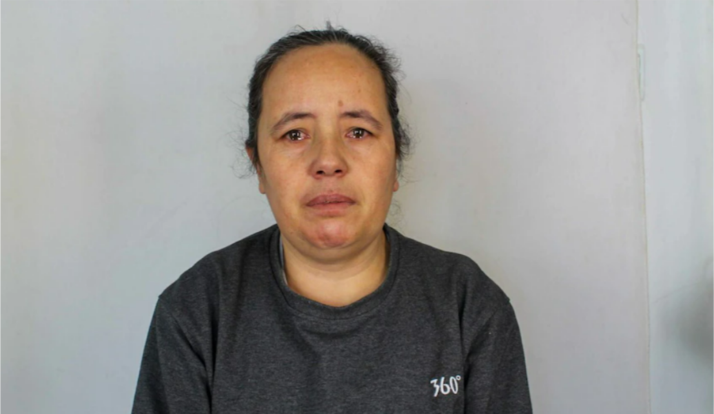 A woman with tears in her eyes