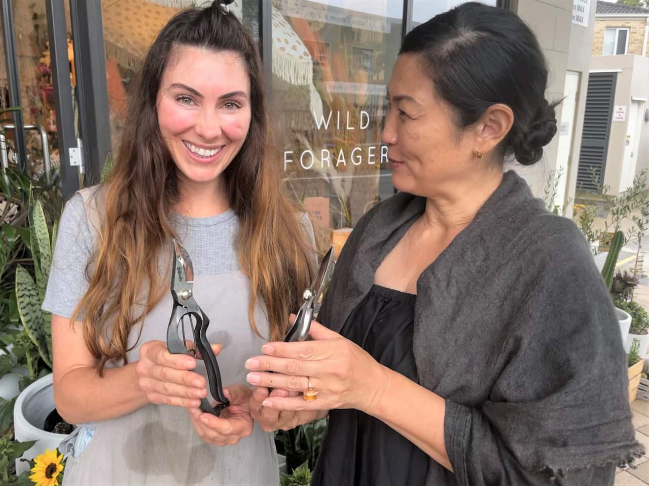 Florist Sarah Kelman (left) with Yuko Nakao