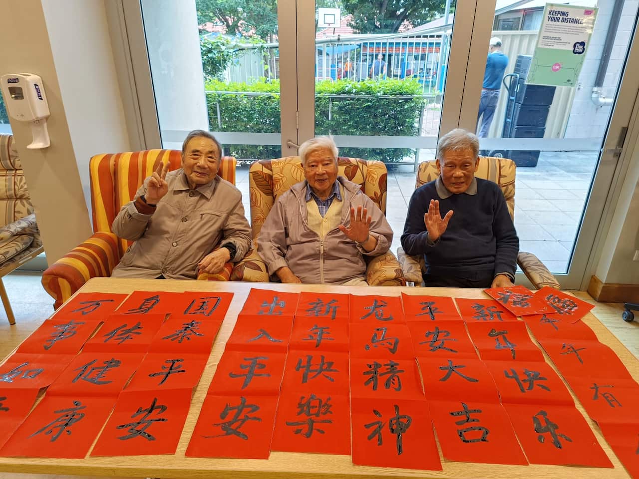 Residents at Residential Aged Care Facility (RACF) in Campsie were writing Chinese couplets on red paper to celebrate Chinese New Year