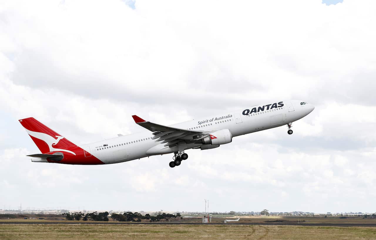 A Qantas plane taking off 