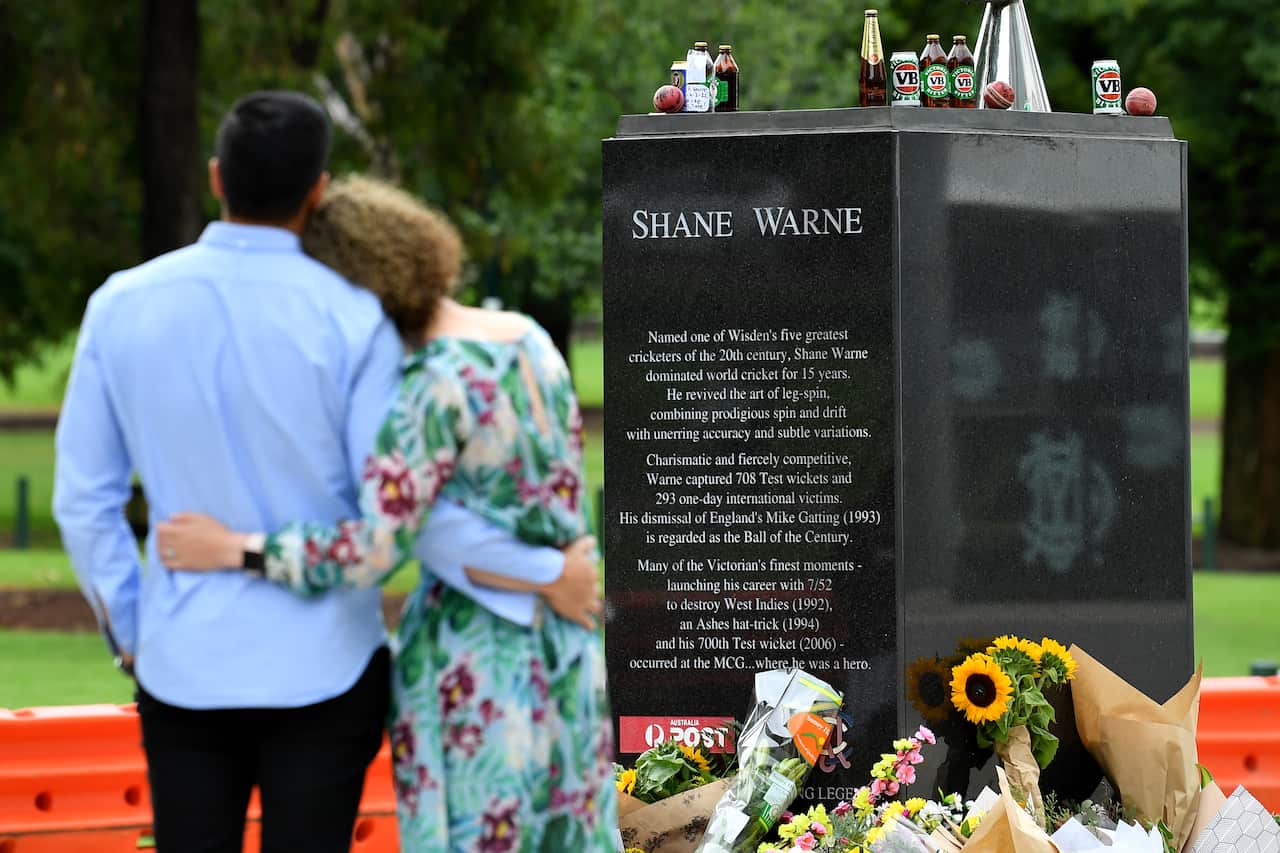 Tributes to cricketer Shane Warne outside the MCG in Melbourne.