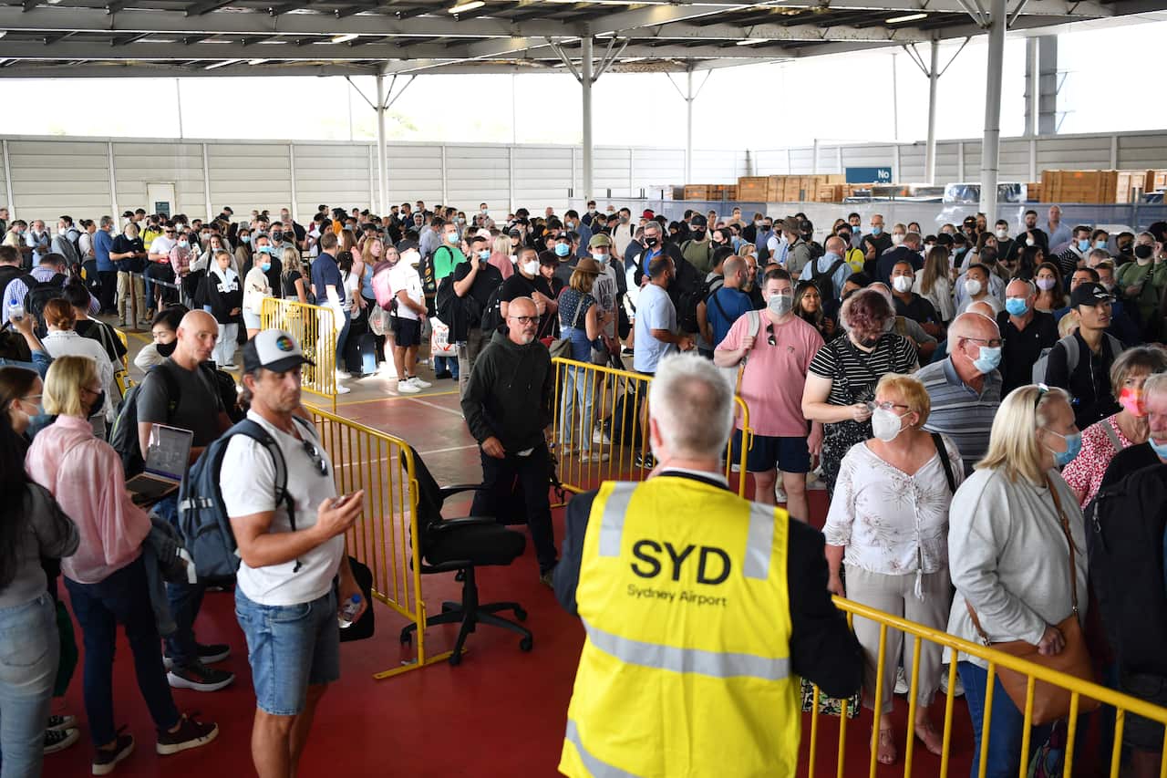 Huge queues at the Virgin and Jetstar domestic terminal at Sydney Airport.