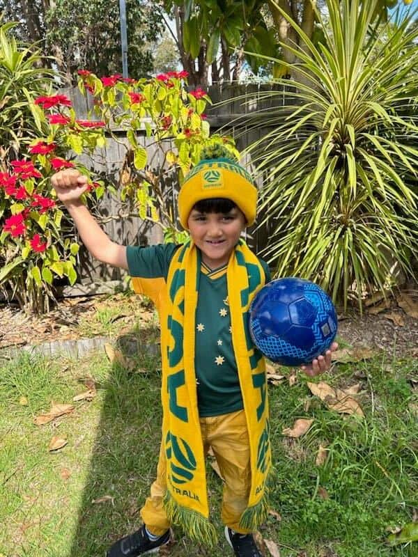 Seven-year-old Nyle Shad dresses up as Sam Kerr for book week