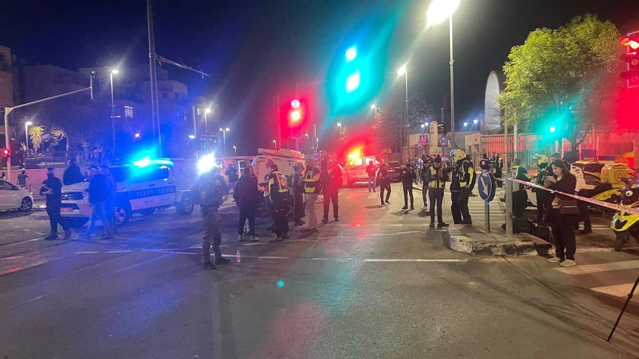 Police officers outside the synagogue where the shooting happened. 