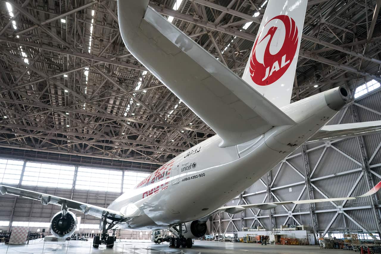 A large aircraft inside a hangar.