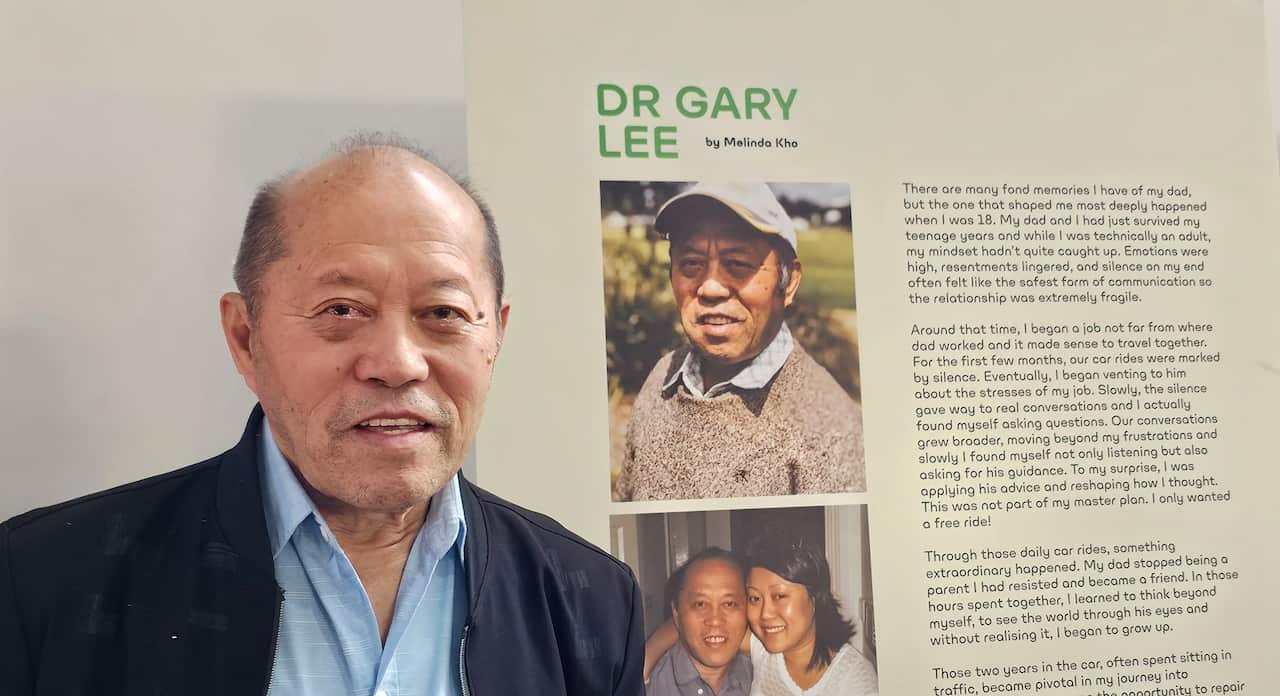 Dr Gary Lee Yia taking a photo Melinda Kho's my dad's story (SBS).jpg