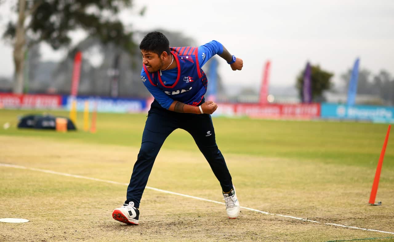 Sandeep Lamichhane warming up ahead of the ICC Men's Cricket World Cup Qualifier Zimbabwe 2023 Playoff match between Ireland and Nepal at Takashinga Cricket Club on 4 July 2023.