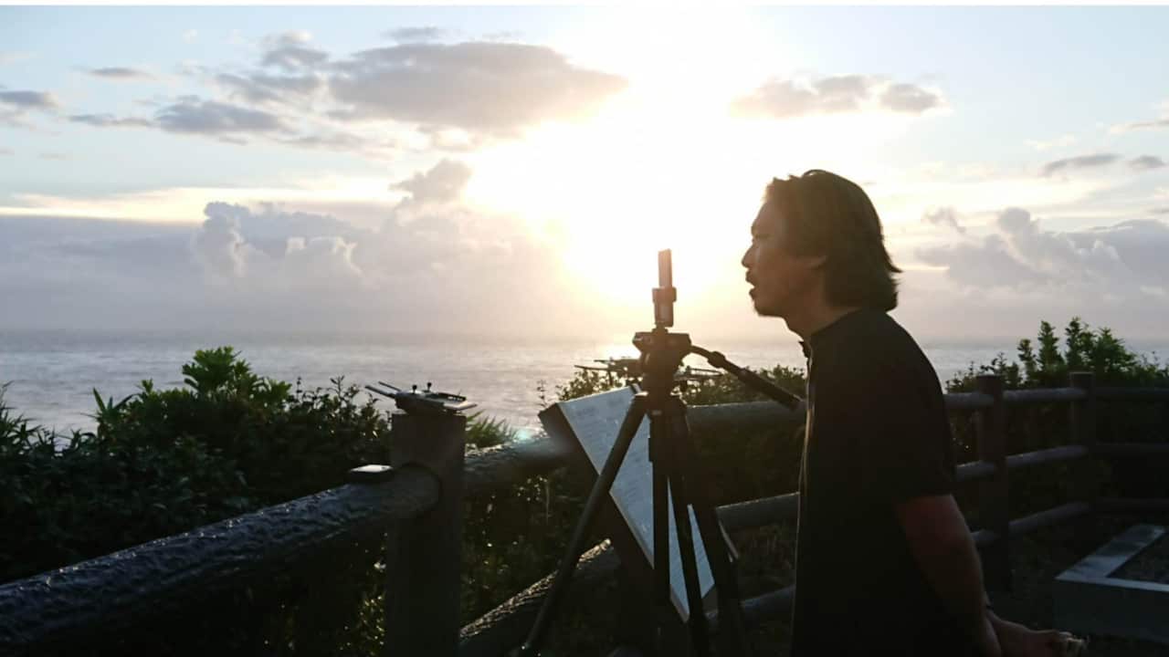 A man looks out to sea.