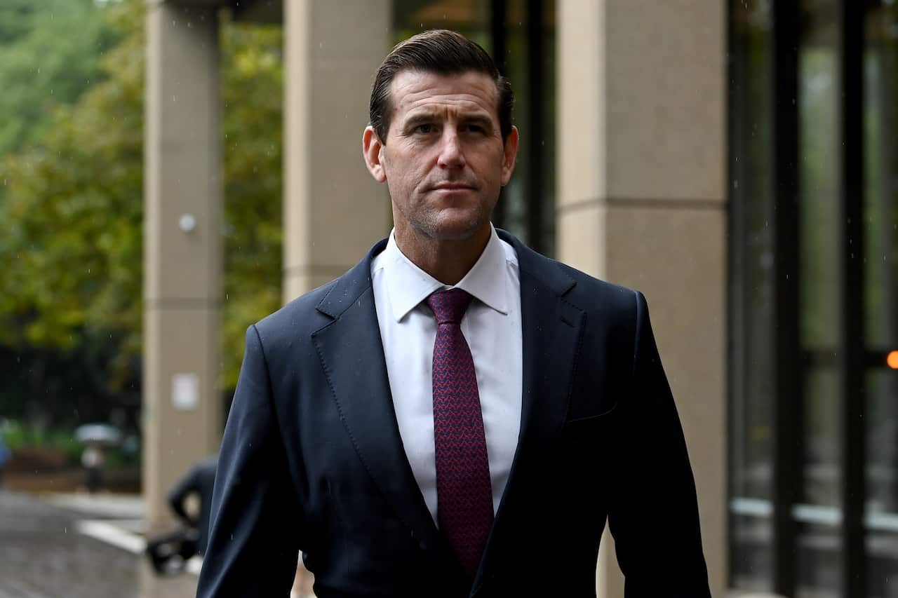 Ben Roberts-Smith in a suit outside court