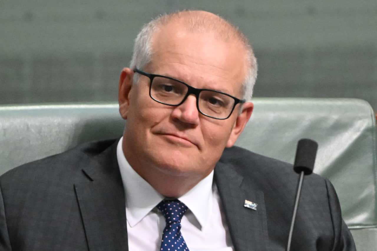 Scott Morrison sits in parliament.