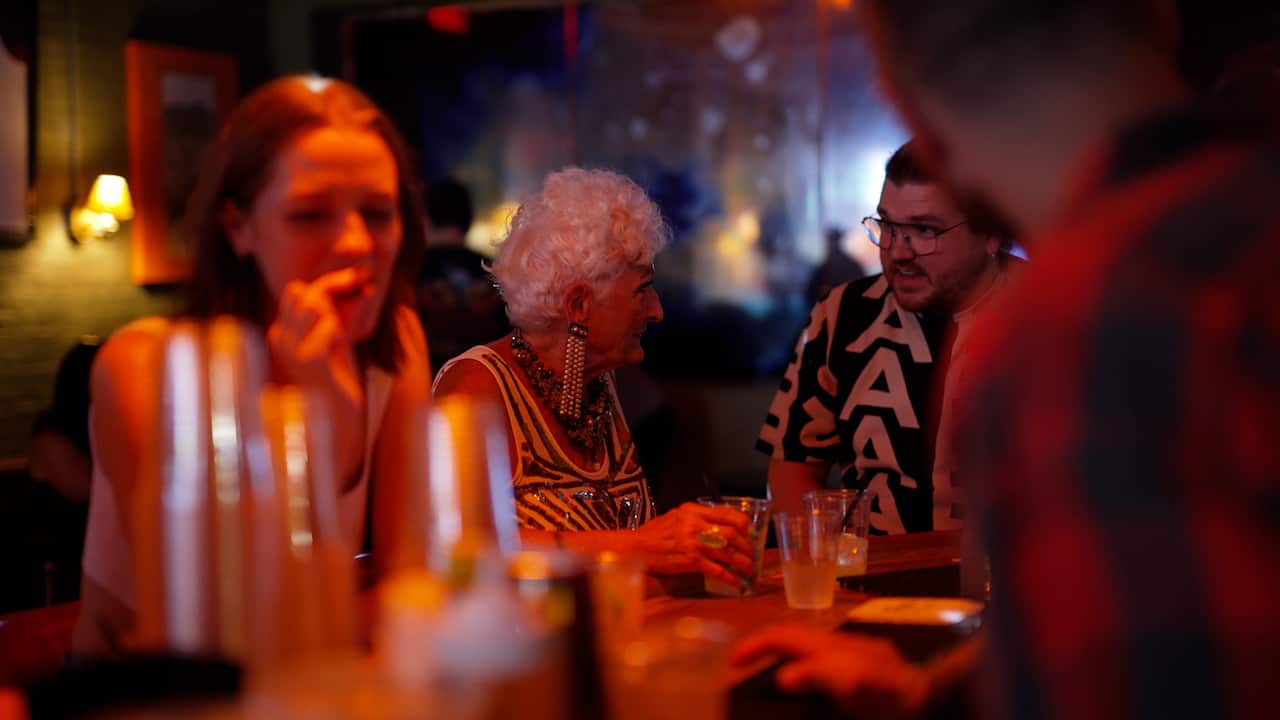 A bar with people drinking.
