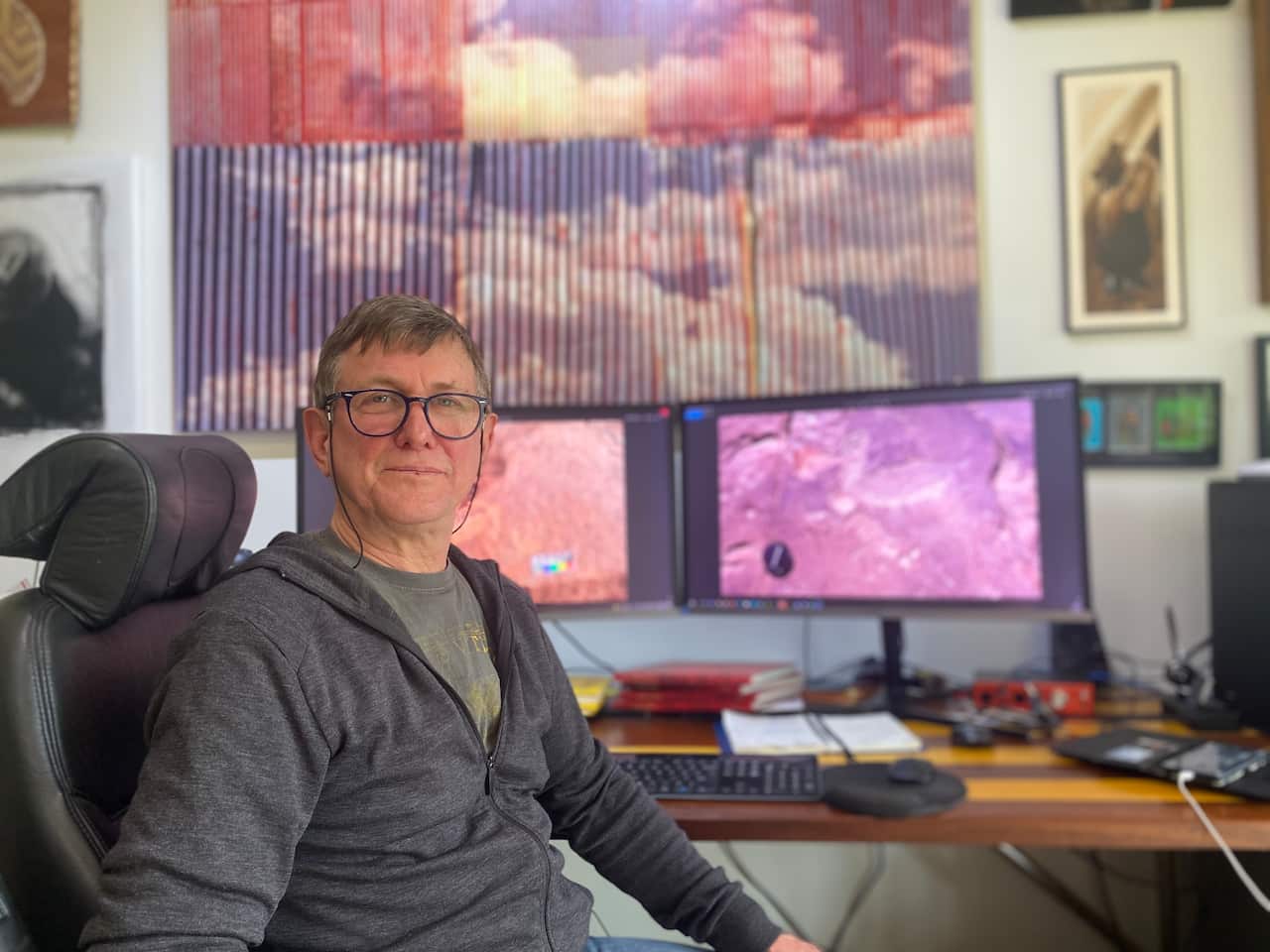 Archaeologist Neale Draper at his desk.