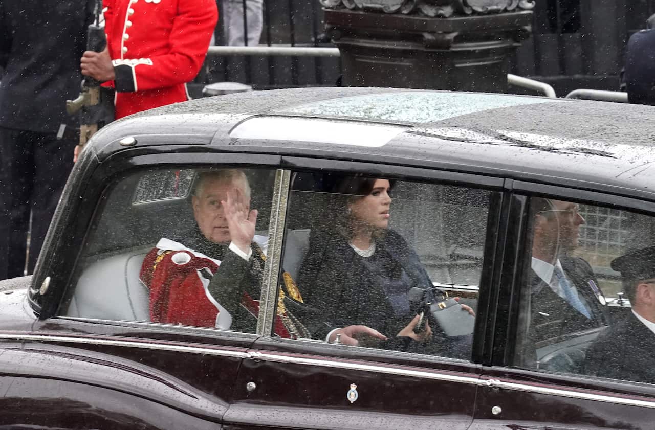 The Duke of York and Princess Eugenie travel along The Mall ahead of the coronation ceremony of King Charles III and Queen Camilla in central London.