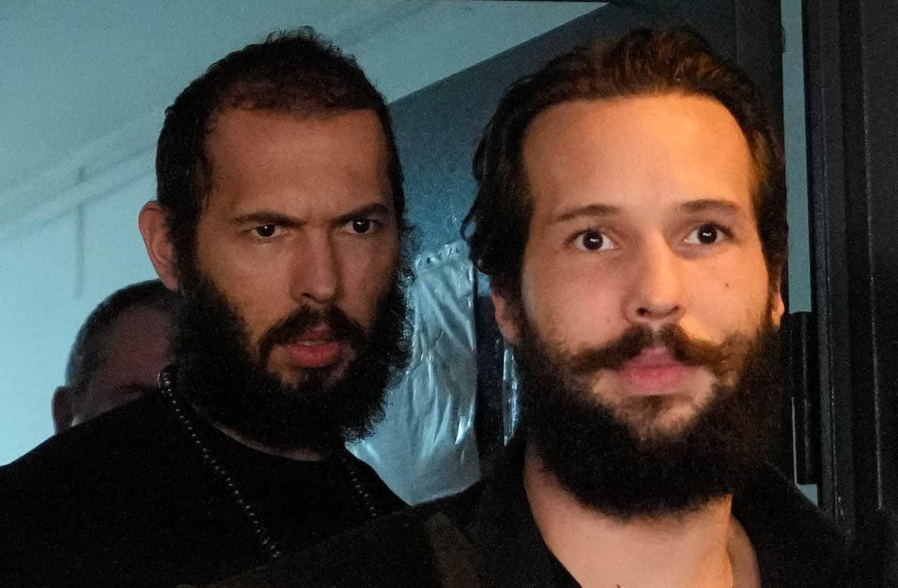 Two bi-racial men with beards