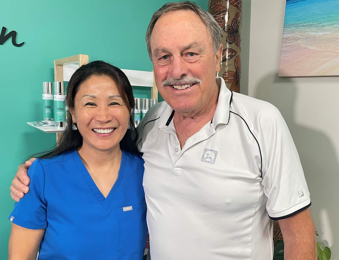 Helen Shao with her client and landlord, John Newcombe (right)