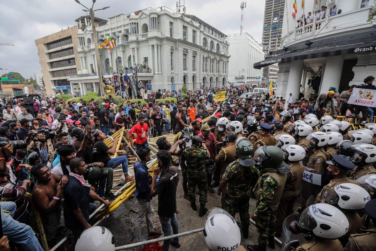 Several people take part in a protest