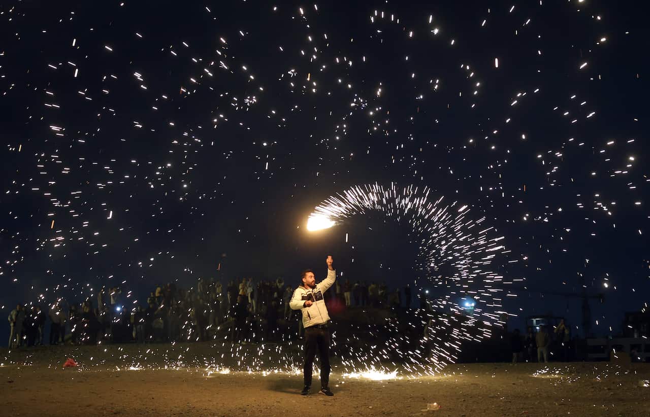 Iranians celebrate traditional fire feast Charshanbeh Suri ahead of Nowruz
