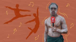 A stylised image of a young First Nations man with his body painted in white ochre, holding an SBS microphone. Behind him, two silhouetted dancers move in celebration and musical notes drift through the backdrop.