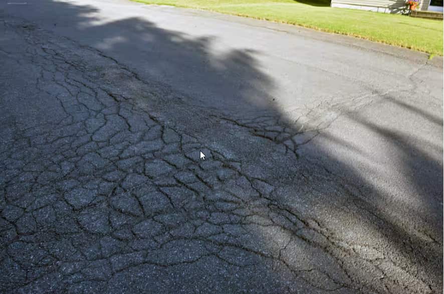 Potholes are often preceded by cracks in the road, which are easier and less costly to repair..png