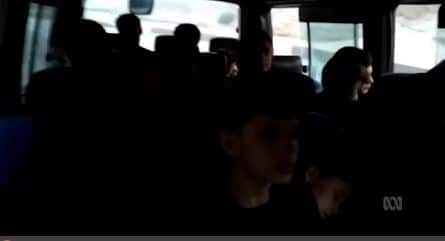 Silhouette of people on a bus