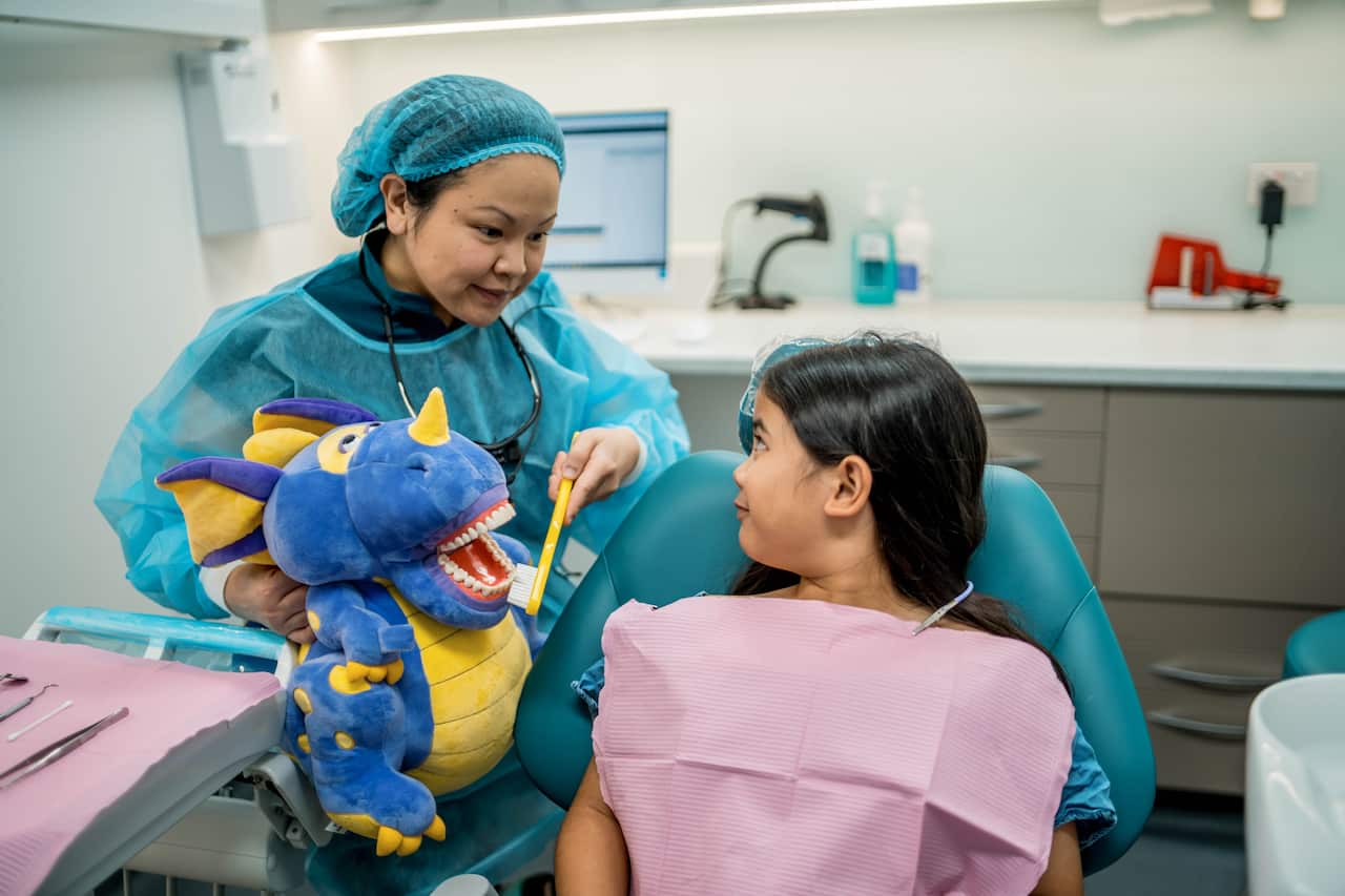 Dr Angelica Abesamis with patient.jpg