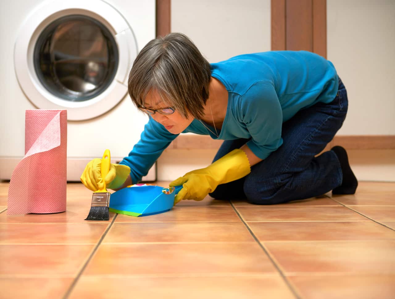 Woman in kitchen with OCD