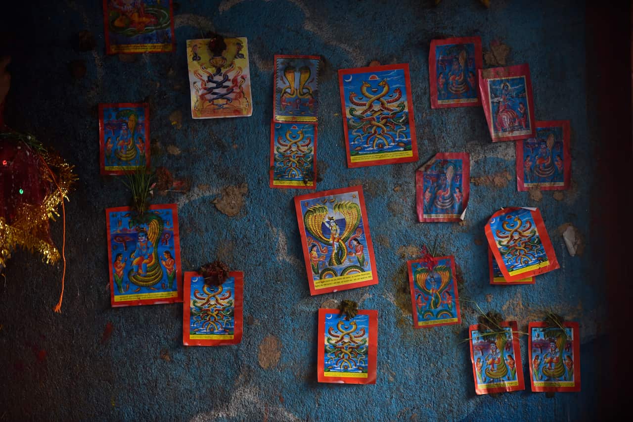The wall of a temple seen with Naga posters during Nag Panchami celebration at Naxal, Kathmandu.