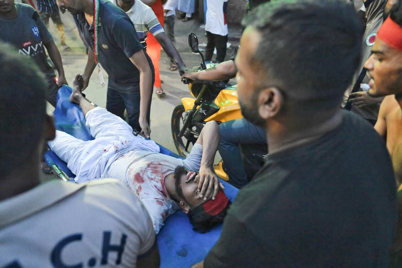 Protesters get injured after anti-quota protests in Dhaka, Bangladesh - 4 Aug 2024