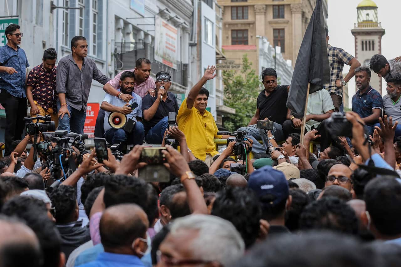 Sri Lanka's Opposition Leader and leader of the Samagi Jana Balawegaya Sajith Premadasa acknowledges supporters in Colombo, Sri Lanka, 30 June 2022. 