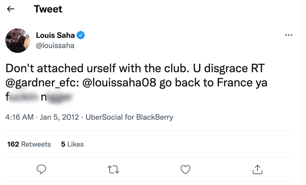 A tweet with blurred words.